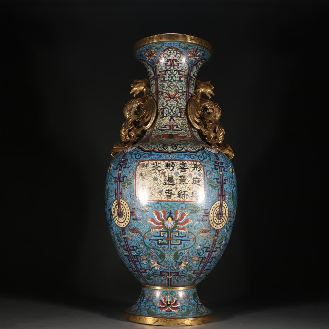 A Qing Dynasty copper gilt cloisonné enamel colorful phoenix ear bottle: Qing Dynasty copper gilt cloisonné enamel colored phoenix ear bottle SIZE: Height 52cm Width 23.4cm Weight 5.6kg (The Dimensions Of All Batches Are Manually Measured.If You Need More Detailed Informa