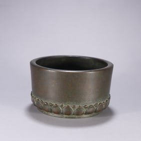 A Qing Dynasty copper lotus incense burner