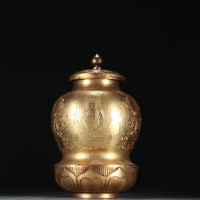 A copper gilt Buddha pattern jar