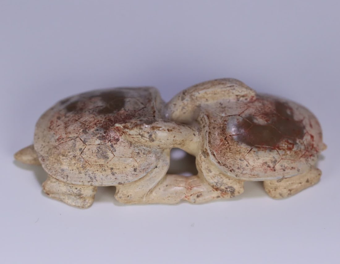 A carving of an ancient jade double turtle: The ancient jade double turtle carving SIZE: 7.3x3.2x1.7cm Weight 46.8g (The Dimensions Of All Batches Are Manually Measured.If You Need More Detailed Information, Please Contact Our Customer