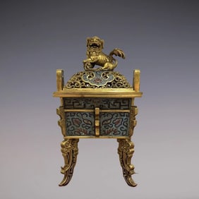 A cloisonné cloisonné enamel gilt gluttonous pattern golden lion incense tripod from the Qing