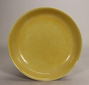 A Ming Jiajing yellow glazed plate