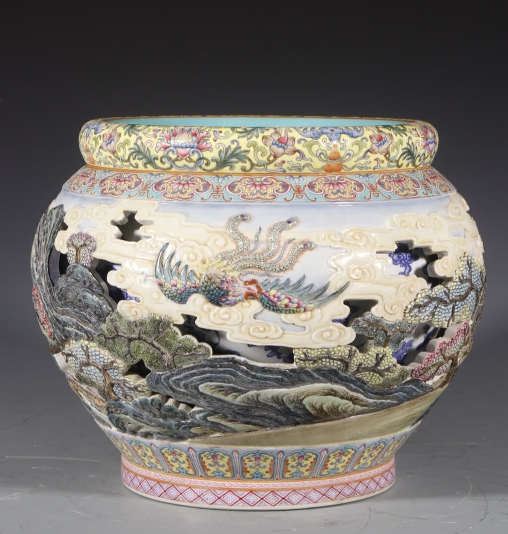 A Qing Qianlong hollow carving with a wind instrument cylinder (1 of 9)