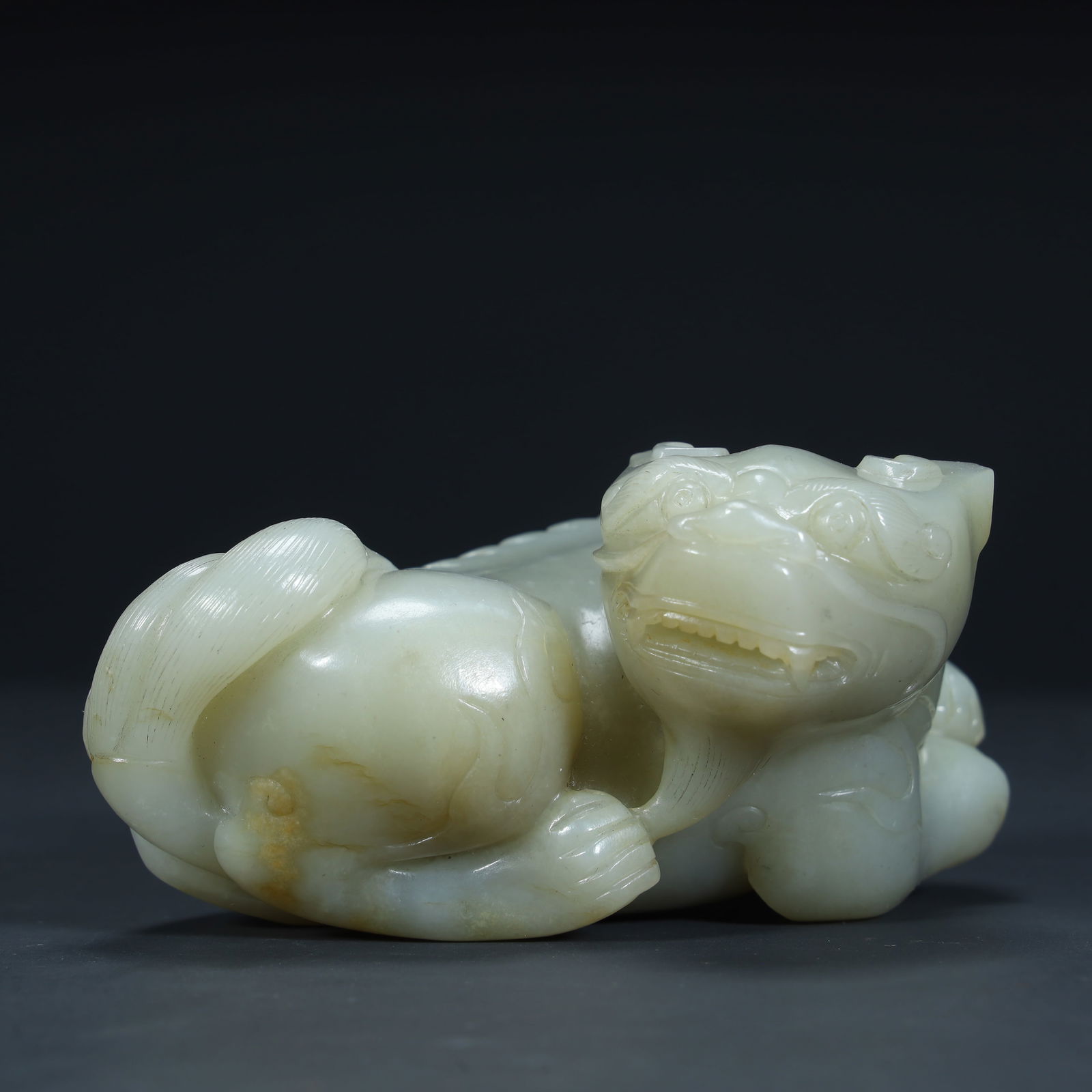 Qing Dynasty white jade round carving to ward off evil beasts (1 of 10)
