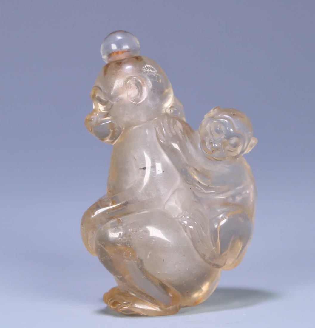 A Qing Dynasty natural crystal "generations of marquises" snuff bottles (1 of 9)