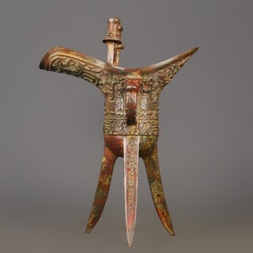 A Western Zhou bronze phoenix bird pattern cup