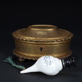 18th-century Tibetan Buddhist silver-gilt entwined treasure box and Tibetan Buddhist right-handed