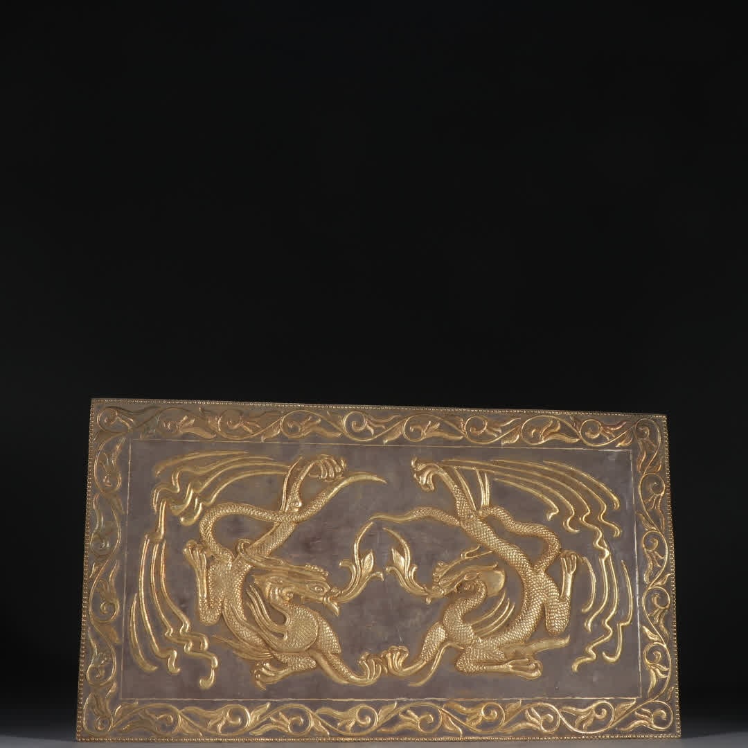 A Qing Dynasty silver-gilt double dragon pattern plate (1 of 9)