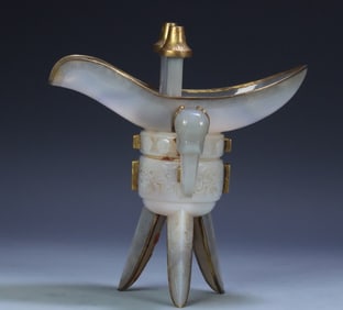 A Qing Dynasty agate inlaid copper gilt cup