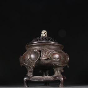 A Ming Dynasty Xuande copper tire elephant pattern aroma burner