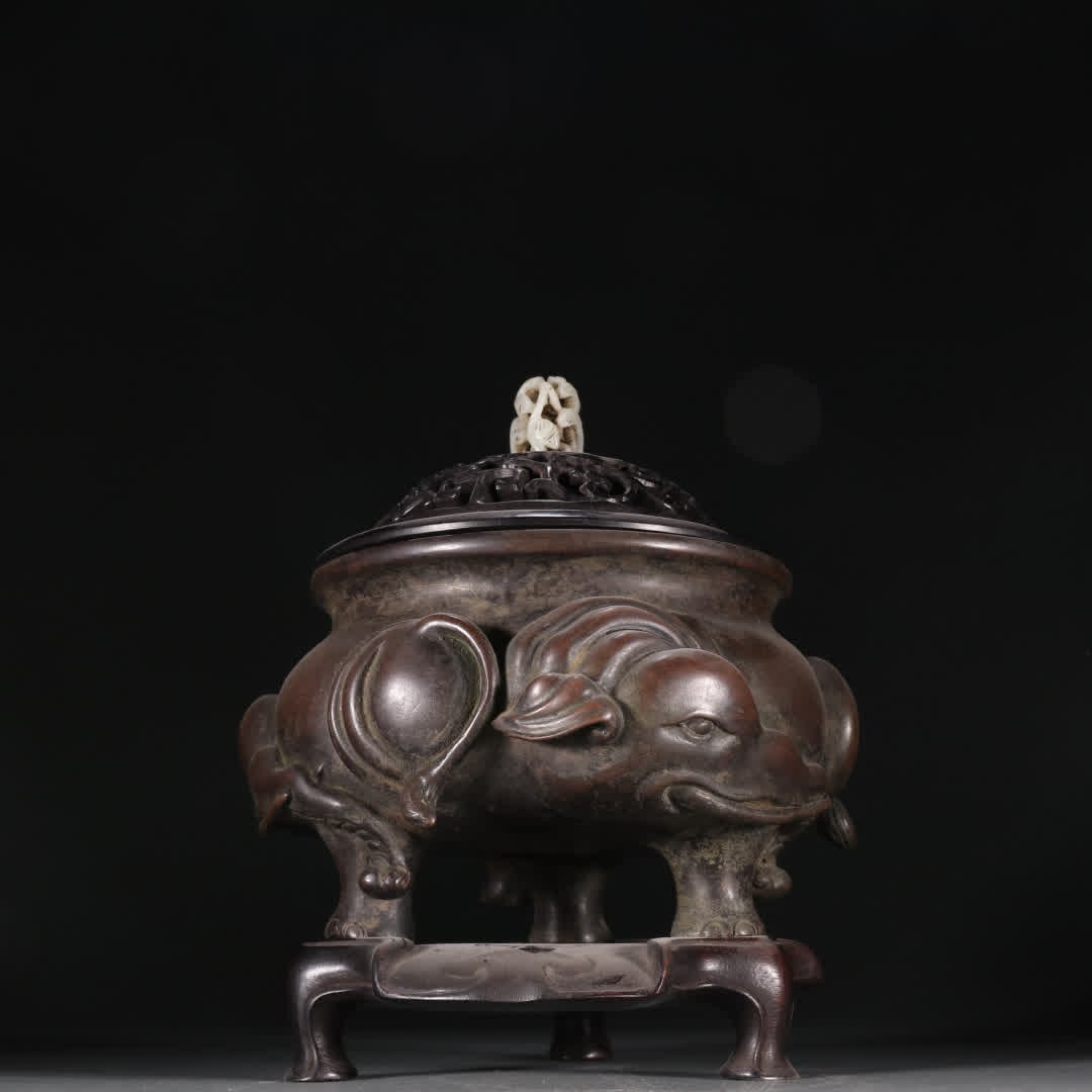 A Ming Dynasty Xuande copper tire elephant pattern aroma burner (1 of 9)