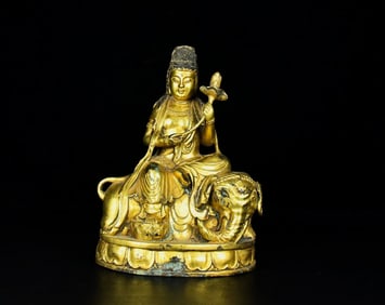 A gilded seat of the Tang Dynasty resembles Guanyin Buddha
