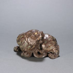 A bronze silver inlaid turquoise beast ornament