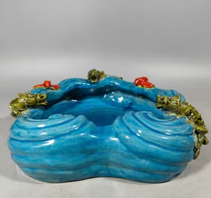 A brush wash of peacock blue glaze in the Qing Dynasty