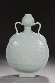 A Qing Qianlong pink blue glaze relief seawater dragon pattern amphorae head flat pot