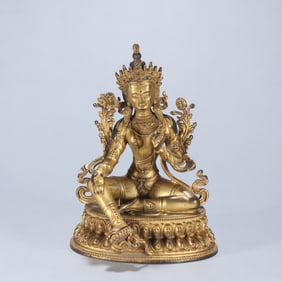 A bronze gilt statue of Tara