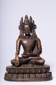 A seated statue of a bronze Buddha in the Qing Dynasty
