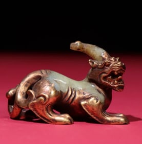A Han Dynasty jade-gilt beast
