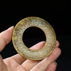 A piece of ancient jade spring and autumn hooked with cloud pattern jade