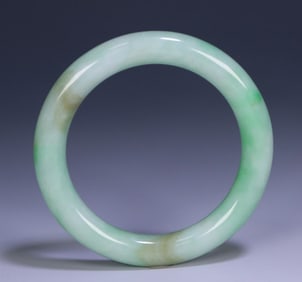 A Qing Dynasty natural jade round bar bracelet,