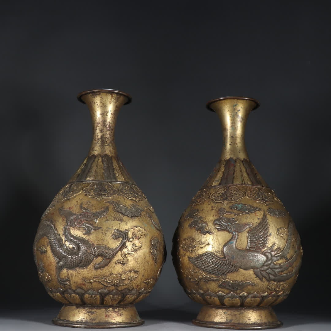 A pair of copper gilt dragon and phoenix pattern vases: A pair of copper-gilt dragon and phoenix pattern vases SIZE: Height 29.5cm width 15.7cm Single weight 1590.3g (The Dimensions Of All Batches Are Manually Measured.If You Need More Detailed Information