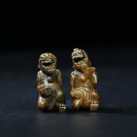 A pair of ancient jade beasts