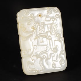 A Qing Dynasty Hetian jade dragon and phoenix card
