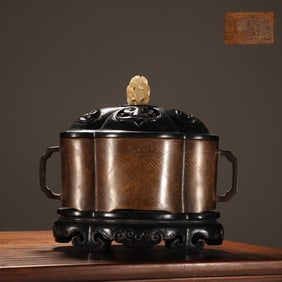 A Ming Dynasty precision cast copper tire and silver silk begonia furnace