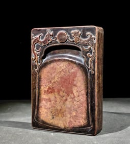 A Qing Dynasty dragon and phoenix auspicious red silk inkstone