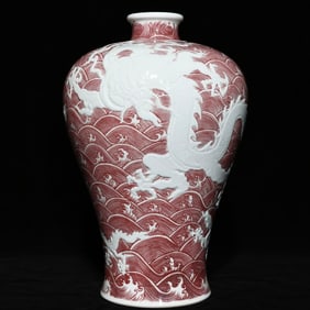 A Qing Yongzheng glazed red wave cone arch Canglong godson Tumei bottle