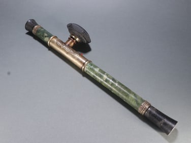 A piece of jade-coated copper bong