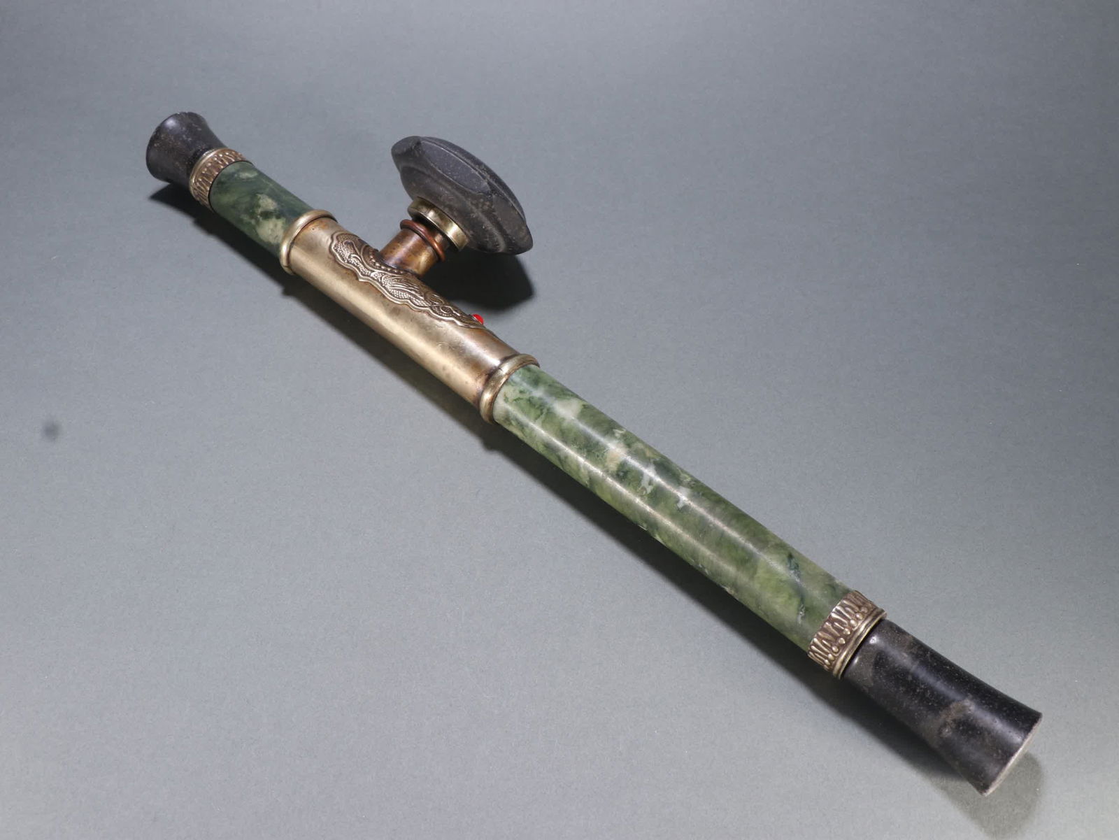 A piece of jade-coated copper bong: The green jade wrapped copper smoking gun SIZE: Length 43.4cm width 3.4cm Weight 589.1g (The Dimensions Of All Batches Are Manually Measured.If You Need More Detailed Information, Please Contact Our C