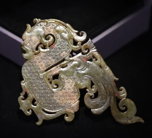 A piece of ancient jade dragon pattern carving from the Warring Han Dynasty