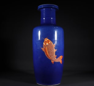 A Qing Dynasty Kangxi blue glazed alum red stick bottle