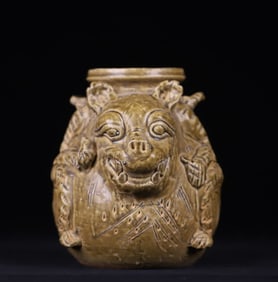 A Western Jin Dynasty celadon plastic pig head pattern double jar