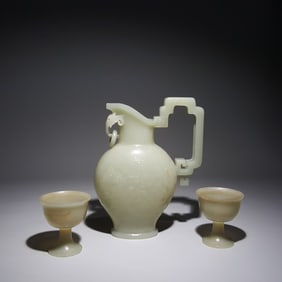 A Qing Dynasty Hetian jade carved dragon poetry wine pot wine glass