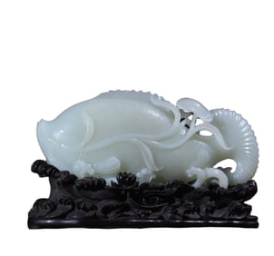 A piece of white jade fish in the Qing Dynasty every year