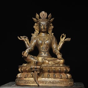 A bronze clay gold six-armed Guanyin Buddha statue