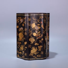 A Qing Qianlong era wooden tire lacquered gold painting eight treasure swastika pattern pen holder