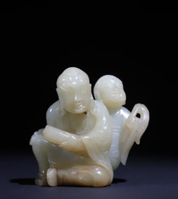 A Qing Dynasty green jade arhat teaching