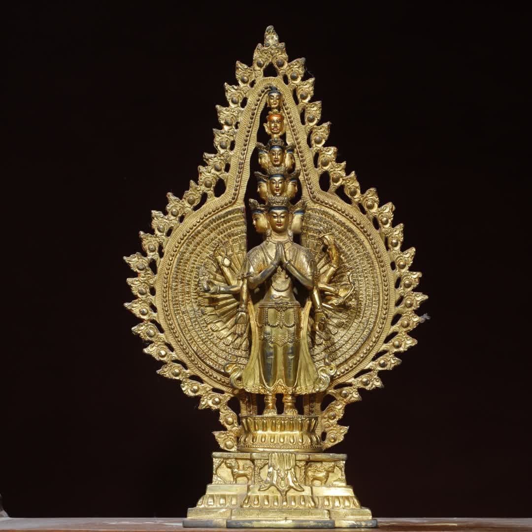 A bronze gilt thousand-handed Guanyin Buddha statue: Copper gilt painted thousand-handed Guanyin Buddha statue SIZE: Height 40cm, width 24cm, thickness 8.5cm, weight 2.32kg (The Dimensions Of All Batches Are Manually Measured.If You Need More Detailed I