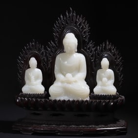 A set of white jade statues of the Three Buddhas in the Qing Dynasty
