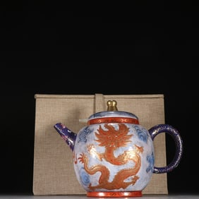 A Qing Dynasty purple sand painting enamel dragon pattern teapot