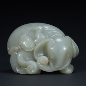 Ming Dynasty green and white jade "boy washing elephant" ornament,