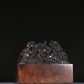 A Qing Dynasty agarwood dragon play bead button seal