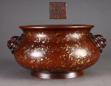 A piece of Ming Dynasty precision cast copper tire dotted with gold sprinkled with gold lion head