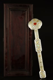 A Qing Dynasty white jade ruyi ornament