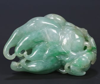 A piece of Qing Dynasty jadeite "three more" handles