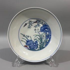 A Qing Dynasty Qing Yongzheng Doucai flower and grass plate