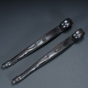 Qing Dynasty rosewood "cirrus pattern" ruyi ornaments, a pair